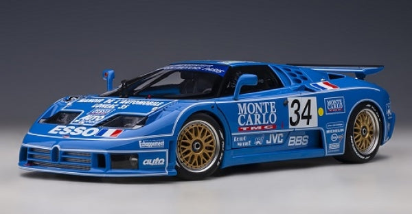 Blue diecast model race car with number 34, Monte Carlo decals, gold wheels, 1:18 scale