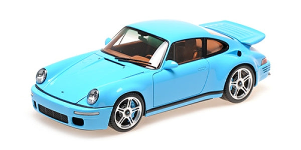 Blue 1:18 scale diecast model car with sporty design and detailed interior