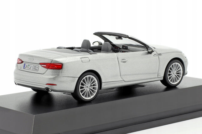 https://a.allegroimg.com/original/119e4d/fd3097e34c389cd9dcc79abf631a/Audi-A5-Cabriolet-F5-2017-Florett-Silver-Spark-1-43-1-43-Model-Samochodu-Stan-opakowania-oryginalne
