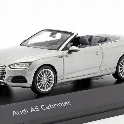 https://a.allegroimg.com/original/11d1cf/a705ee164bebb5d394f7d7c3f240/Audi-A5-Cabriolet-F5-2017-Florett-Silver-Spark-1-43-1-43-Model-Samochodu