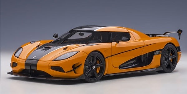1:18 scale orange diecast model sports car with black detailing on a grey background