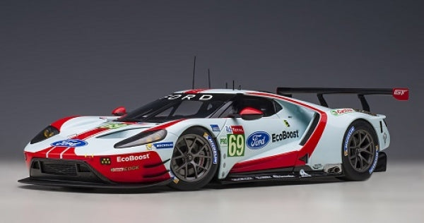 1:18 scale diecast Ford GT race car model in red, white, blue with detailed sponsor logos