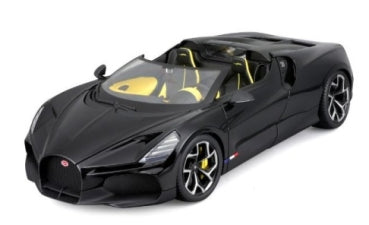 Black 1:18 scale diecast model sports car with yellow interior and detailed rims