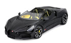 Black diecast model sports car, convertible, detailed yellow interior, 1:18 scale collectible.