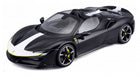 1:18 scale black diecast model car with white racing stripe and yellow accents