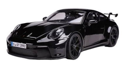 Black diecast model sports car with rear spoiler, detailed headlights and alloy wheels