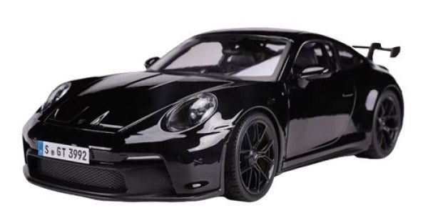 Black diecast model sports car with rear spoiler, detailed headlights and alloy wheels