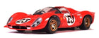 Red diecast model race car with number 23, gold wheels, 1:18 scale, on white background