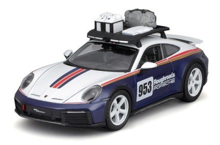1:18 scale diecast Porsche model car with racing decals and roof luggage rack