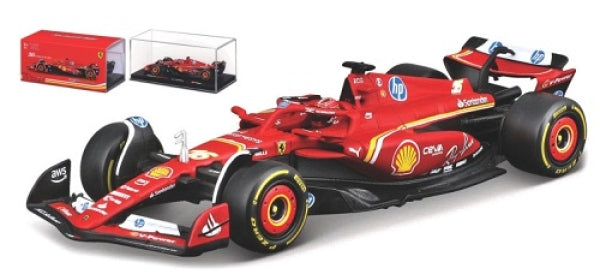 Red diecast Formula 1 model car with sponsor logos, display case and box in background