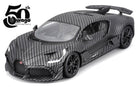 Diecast model car in carbon fiber finish with rear wing, 50th anniversary logo visible.