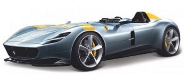 1:18 scale diecast model car, silver with yellow accents, sporty convertible design