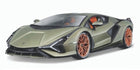 Green diecast model sports car with bronze wheels, 1:18 scale, detailed interior