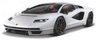 White diecast model sports car with black accents, sleek design, and red interior detailing