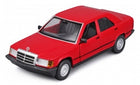 Red diecast model car in 1:24 scale, classic four-door sedan with detailed exterior