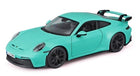 1:18 scale turquoise Porsche 911 GT3 diecast model car with black wheels and rear wing