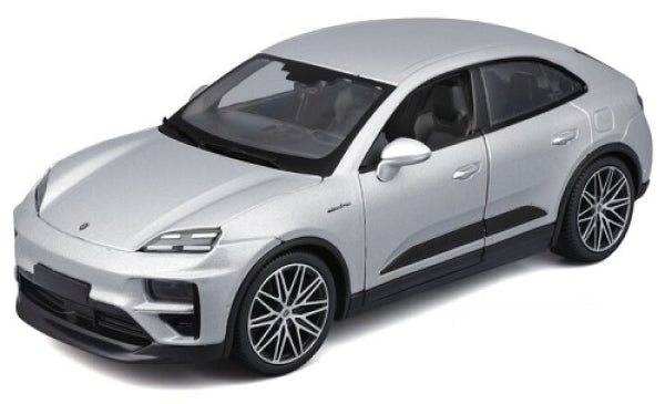 Silver 1:18 scale diecast model car with detailed exterior, modern sporty design