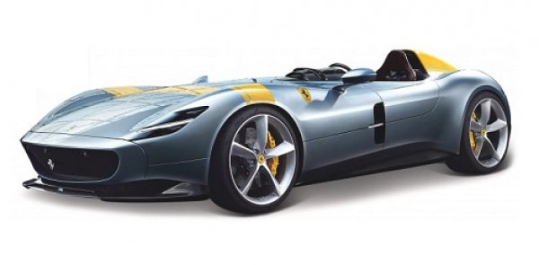 1:18 scale diecast model of a sleek grey open-top sports car with yellow accents.