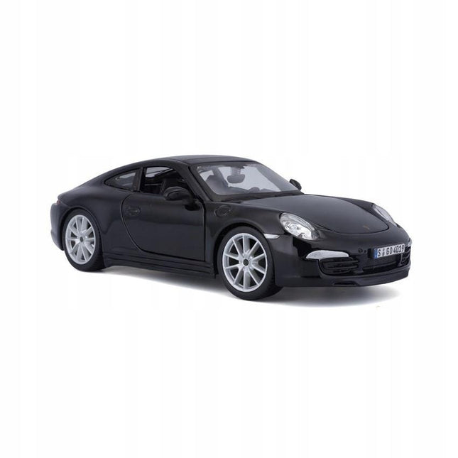 Front-left angled view of a 1:24 scale Bburago Porsche 911 Carrera S 2024 die-cast model on white background. The miniature sports car is finished in gloss black with smooth curves, silver alloy wheels, realistic headlights, and a sloping roofline, representing the iconic 911 silhouette.