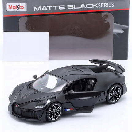 https://a.allegroimg.com/original/1160be/c3075b8d4dd0b91d5a5d9d1df403/Bugatti-Divo-2018-Matte-Black-Series-Maisto-1-24-Matowy-Czarny-Model-31526-Kod-producenta-31526-31526MBk-31526M-31526DB