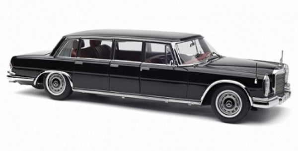 1:18 scale black luxury limousine diecast model car with chrome trim, side view