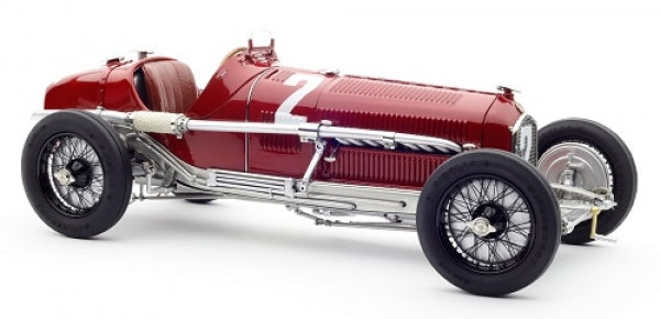 Red vintage diecast race car model with chrome accents and number 2 on side, 1:18 scale