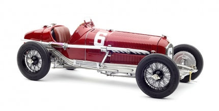 Red vintage race car model with number 6, detailed wire wheels, diecast 1:18 scale