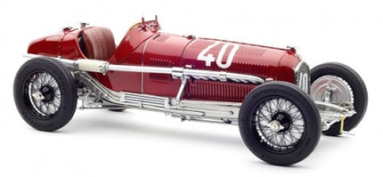 Red vintage racing diecast model car with number 40, detailed chrome accents, 1:18 scale.