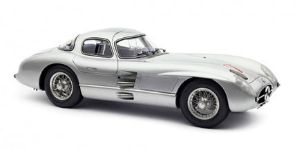 Silver diecast model car 1:18 scale classic coupe with detailed wheels and sleek design