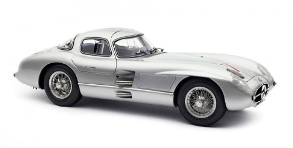 Silver diecast model car 1:18 scale classic coupe with detailed wheels and sleek design