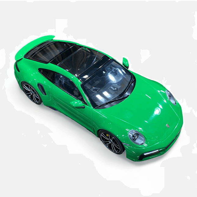 Minichamps Porsche 911 Turbo S 1:18 Resin Model Car Green - studio product photo of the scale model