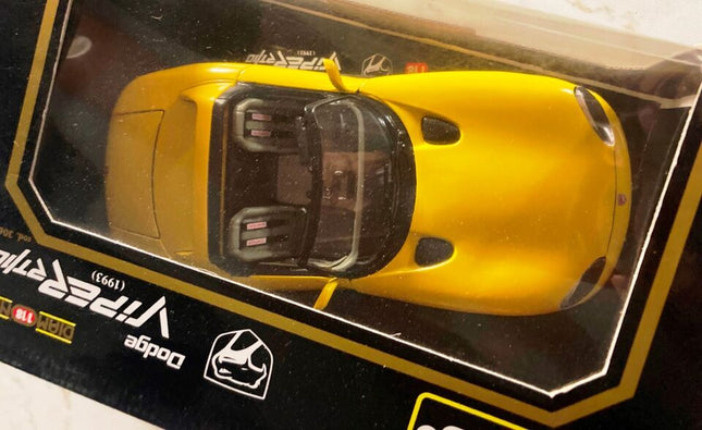 Bburago 1/18 Dodge Viper RT/10 1996 Yellow Diecast Model Car - studio product photo of the scale model