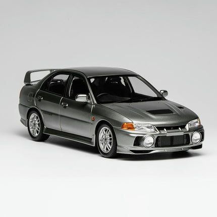 Motorhelix Mitsubishi Lancer Evolution IV Steel Silver 1:18 Diecast Model Car - studio product photo of the scale model