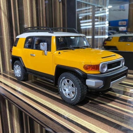 AutoArt Toyota FJ Cruiser Yellow 1:18 Diecast Model Car - detailed collector display model