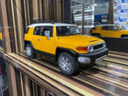 AutoArt Toyota FJ Cruiser Yellow 1:18 Diecast Model Car - detailed collector display model