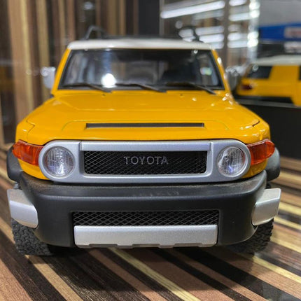 AutoArt Toyota FJ Cruiser Yellow 1:18 Diecast Model Car - collectible scale model car