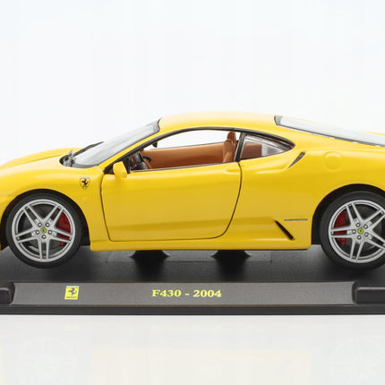 https://a.allegroimg.com/original/11aad7/6112c79c4e53ba23cbd2c4f5fb35/Ferrari-F430-2004-Yellow-Bburago-1-24-1-24-Zolty-Model-Samochodu-AB24F007-Kod-producenta-AB24F007-F007