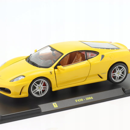 https://a.allegroimg.com/original/114cd5/776dd7f1422685659def216b0f64/Ferrari-F430-2004-Yellow-Bburago-1-24-1-24-Zolty-Model-Samochodu-AB24F007-Skala-skale-1-19-do-1-25