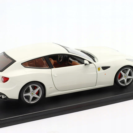 https://a.allegroimg.com/original/112eaa/2af6f83c42469e018850fb1c45ef/Ferrari-FF-Four-2011-White-Bburago-1-24-Edicola-Model-Samochodu-AB24F012-Stan-opakowania-oryginalne