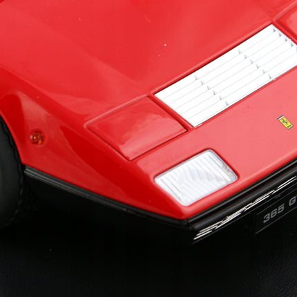 1:18 scale red Ferrari 365 GT4 BB diecast model car front hood and wheel close-up view