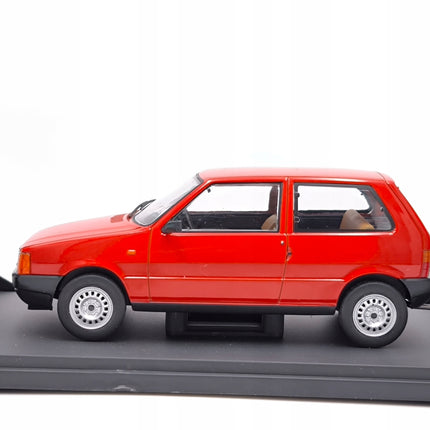 https://a.allegroimg.com/original/11f322/8d519bb94127a64c1057190376a6/Fiat-Uno-1983-Red-WhiteBox-1-24-Czerwony-Metalowy-Model-Samochodu-WB124257-Waga-produktu-z-opakowaniem-jednostkowym-0-5-kg