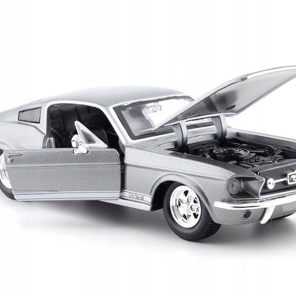https://a.allegroimg.com/original/11076d/e0c6168541c2b2759f6b02ec7ff3/Ford-Mustang-GT-Fastback-1967-Maisto-1-24-Szary-Metalowy-Model-Samochodu-Gy-Marka-Maisto