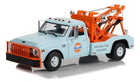 1:18 scale diecast vintage tow truck model with Gulf livery, orange and blue detailing