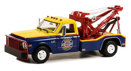 Diecast model tow truck, yellow and blue, with Super Service Chevrolet logo, 1:18 scale