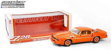 Orange 1980 Chevrolet Camaro Z28 1:18 scale diecast model car with display box.
