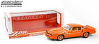 Orange 1980 Chevrolet Camaro Z28 1:18 scale diecast model car with display box.