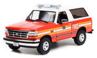 1:18 scale diecast model red Ford fire department SUV with emergency lights and detailed decals