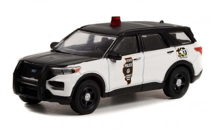 1:24 scale diecast Ford police SUV model with black and white Illinois State Police livery