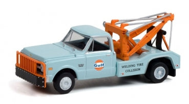 1:24 scale diecast model tow truck in light blue with orange Gulf detailing