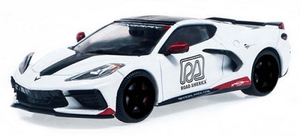 1:18 scale white diecast model Corvette sports car with black accents and Road America logo